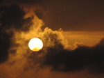 SX07434 Sun shining through clouds at dusk.jpg
